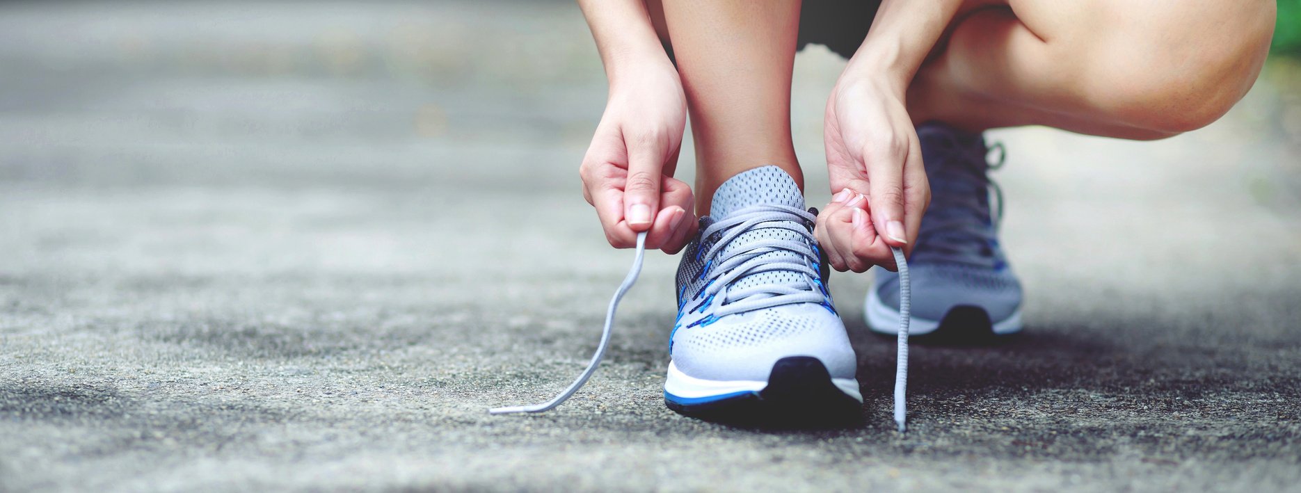 Runner Tying Up Their Shoelace 